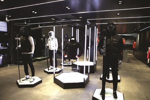 White neon tubes and illuminated plinths lend the interior a real sense of drama